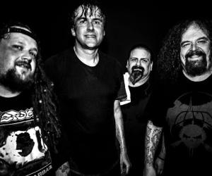 A black and white photo of Napalm Death