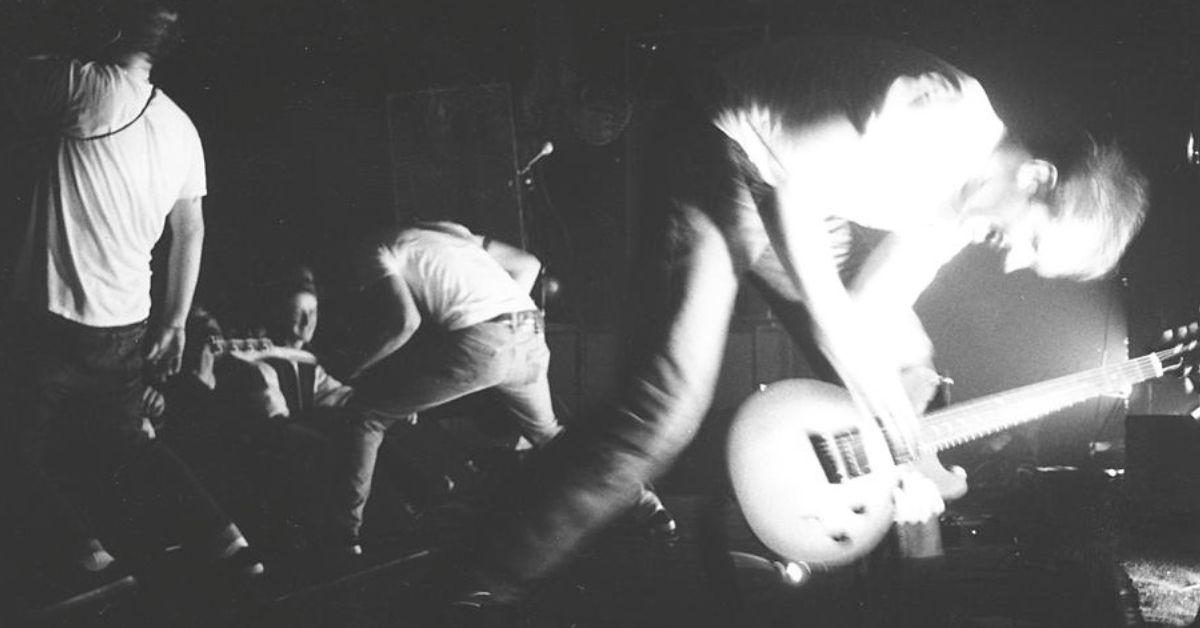 A black and white photo of Botch performing live