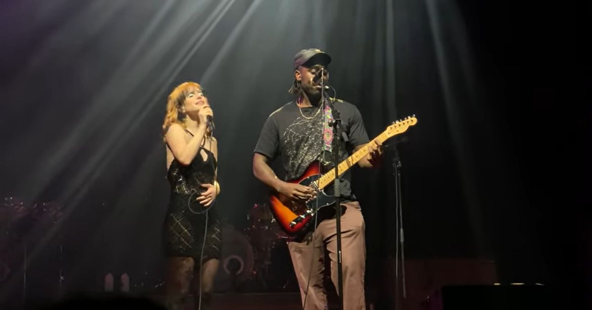 A live photo of Hayley Williams from Paramore and Kele from Bloc Party performing together at the O2 Arena