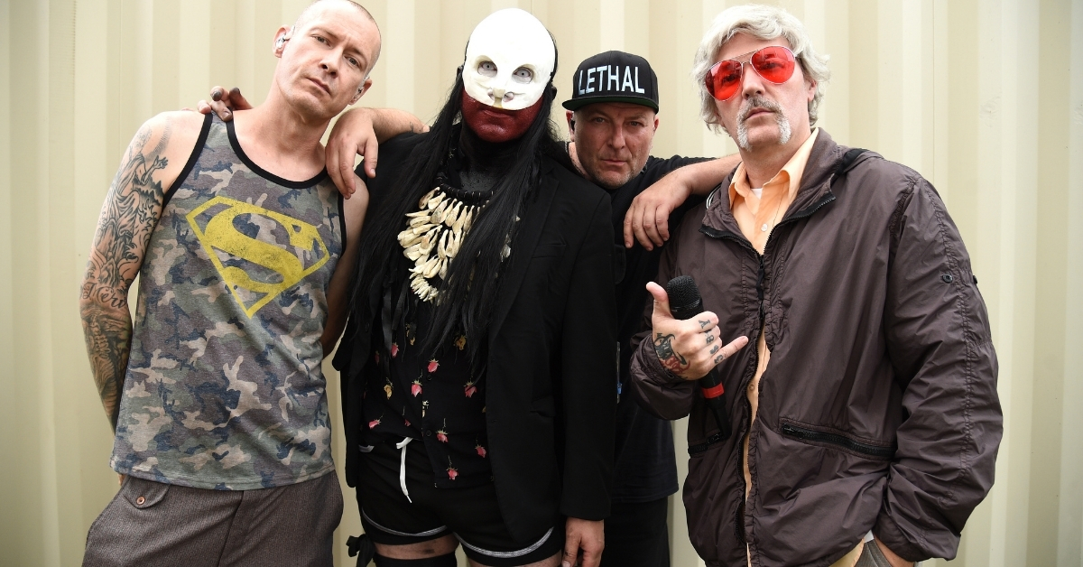 A photo of Limp Bizkit backstage at a live show in 2021