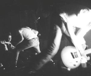 A black and white photo of Botch performing live